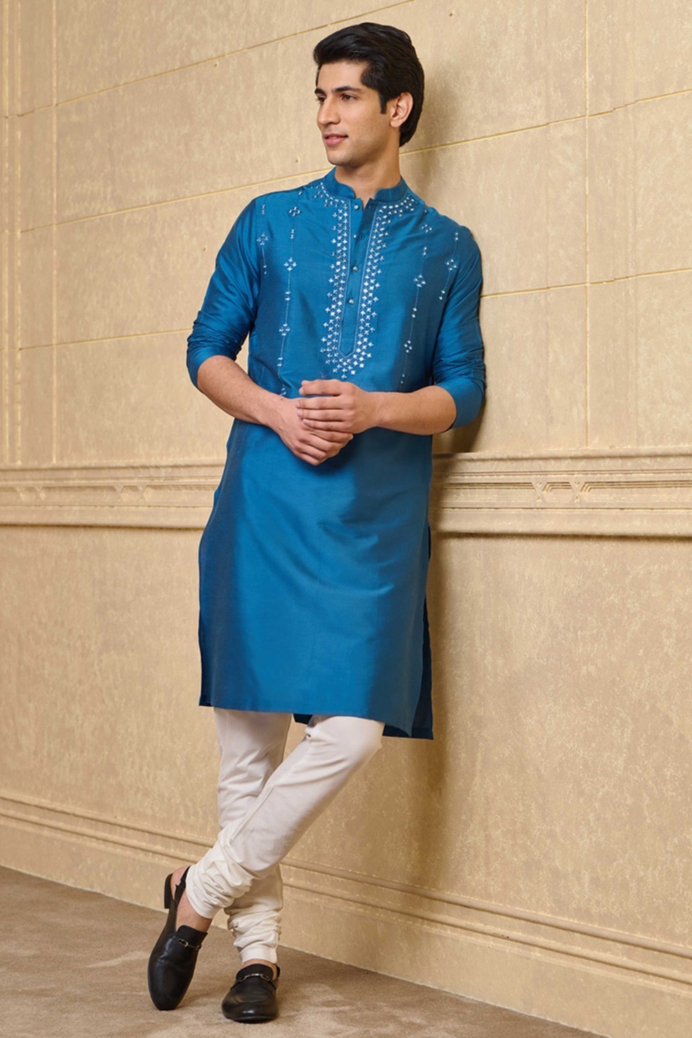 https://www.tasva.com/p/medium-blue-kurta-set-with-mirror-work-highlights-1077583.html